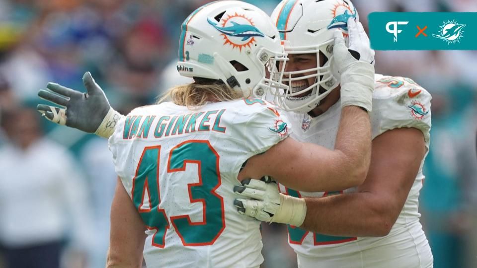 Miami Dolphins LB Andrew Van Ginkel (43) and DT Zach Sieler (92) celebrate a sack.