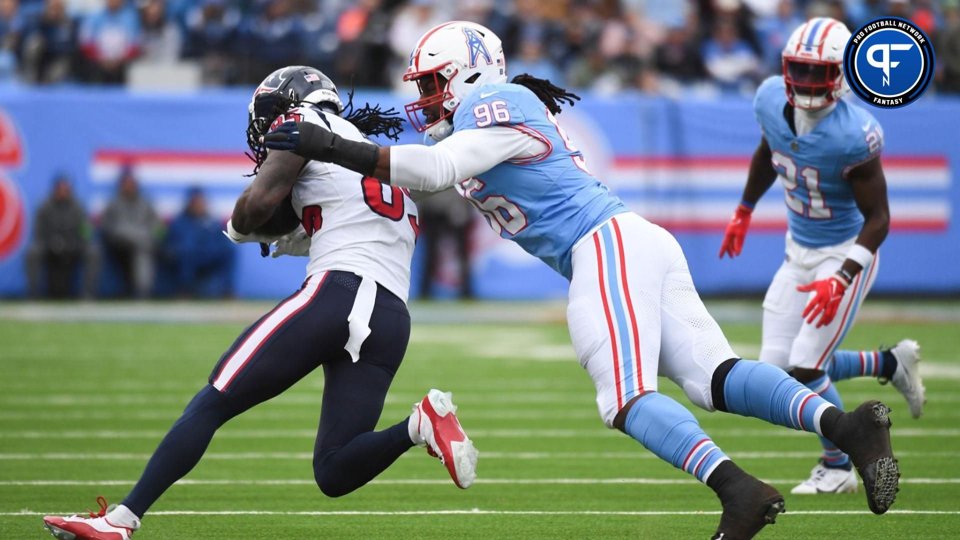 Houston Texans wide receiver Noah Brown (85) is tackled by Tennessee Titans defensive end Denico Autry (96) during the first half at Nissan Stadium.