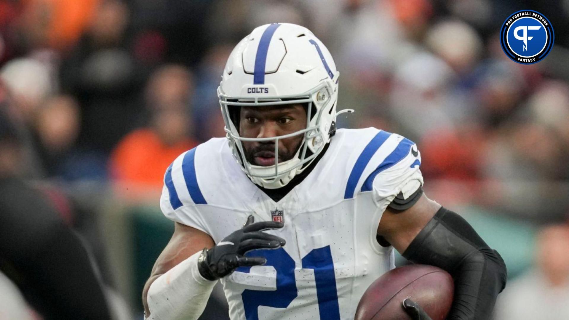 Indianapolis Colts running back Zack Moss (21) rushes the ball Sunday, Dec. 10, 2023, during a game against the Cincinnati Bengals at Paycor Stadium in Cincinnati.