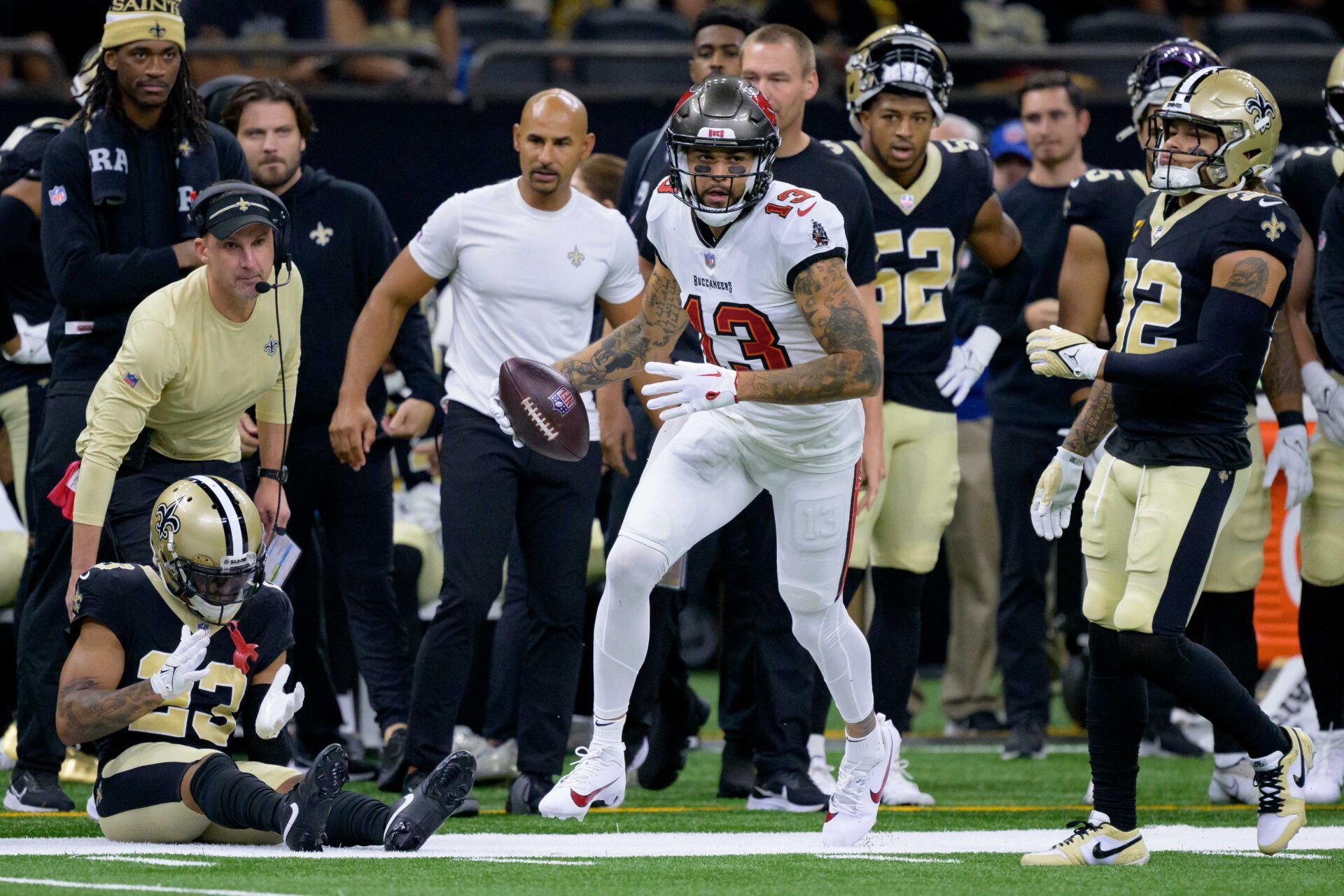 New Orleans Saints wide receiver Michael Thomas (13) gets up after a reception against the New Orleans Saints during the second quarter at the Caesars Superdome.