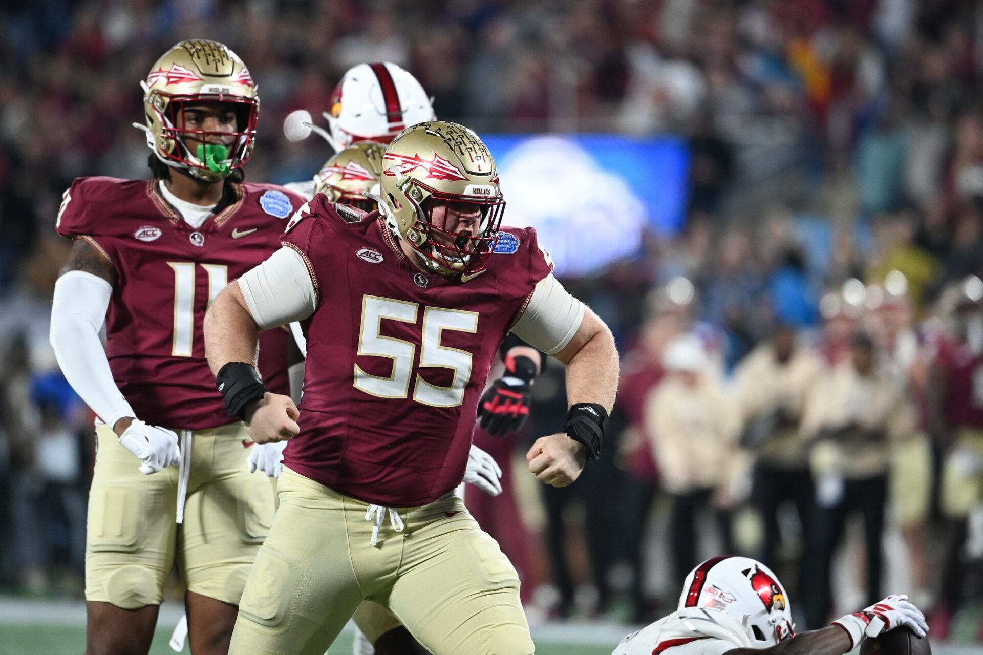 Florida State Seminoles defensive lineman Braden Fiske (55) reacts after a tackle on Louisville Cardinals running back Jawhar Jordan (25) in the first quarter at Bank of America Stadium.