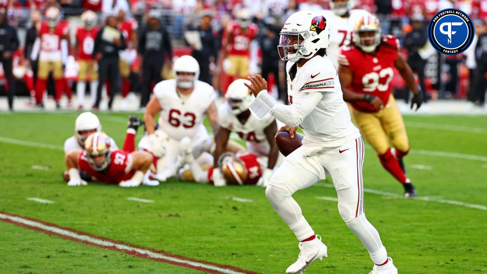 Arizona Cardinals quarterback Kyler Murray (1) runs with the ball during the first quarter against the San Francisco 49ers at State Farm Stadium.