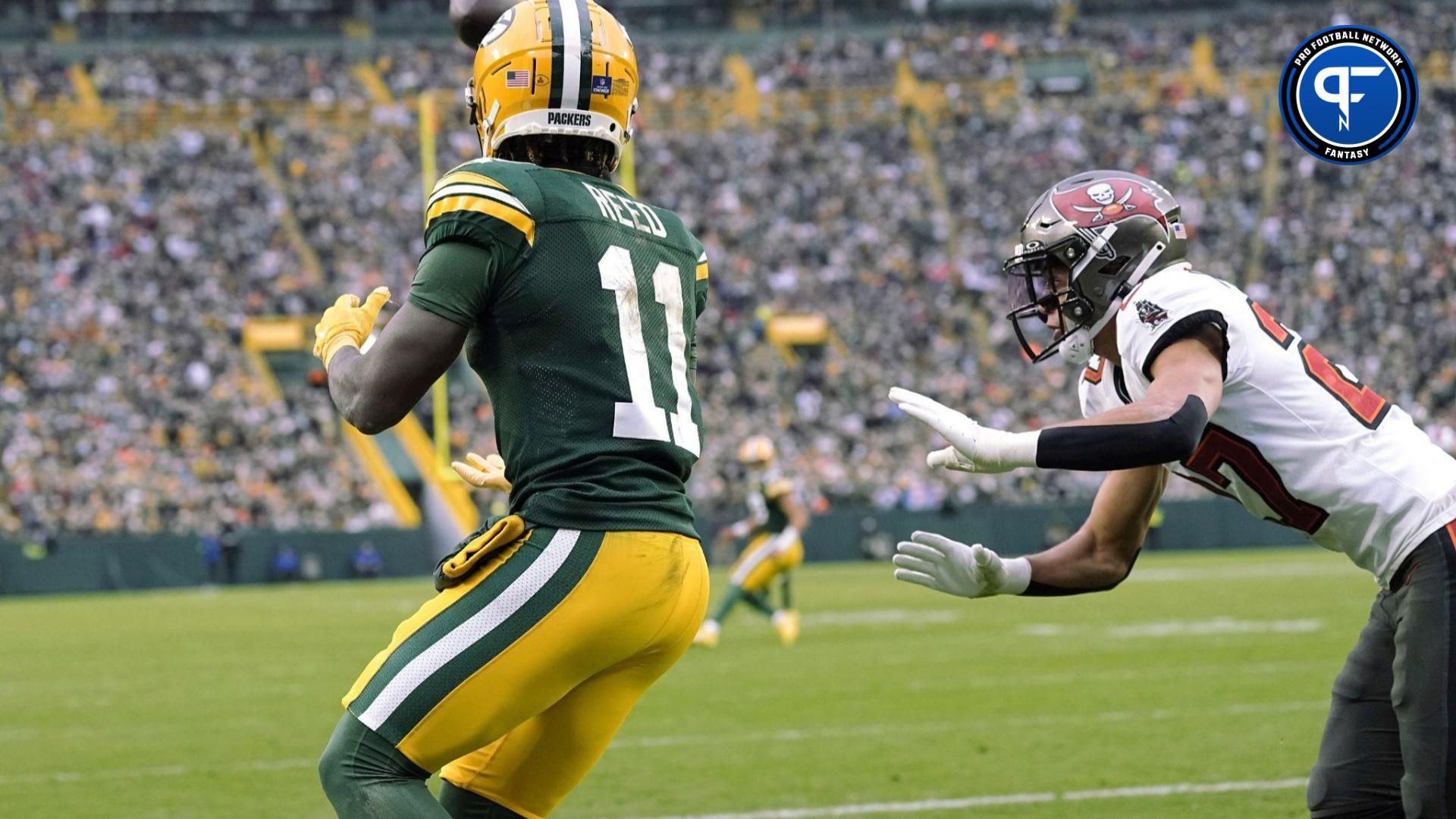 Green Bay Packers WR Jayden Reed looks to catch a TD pass against the Tampa Bay Buccaneers.