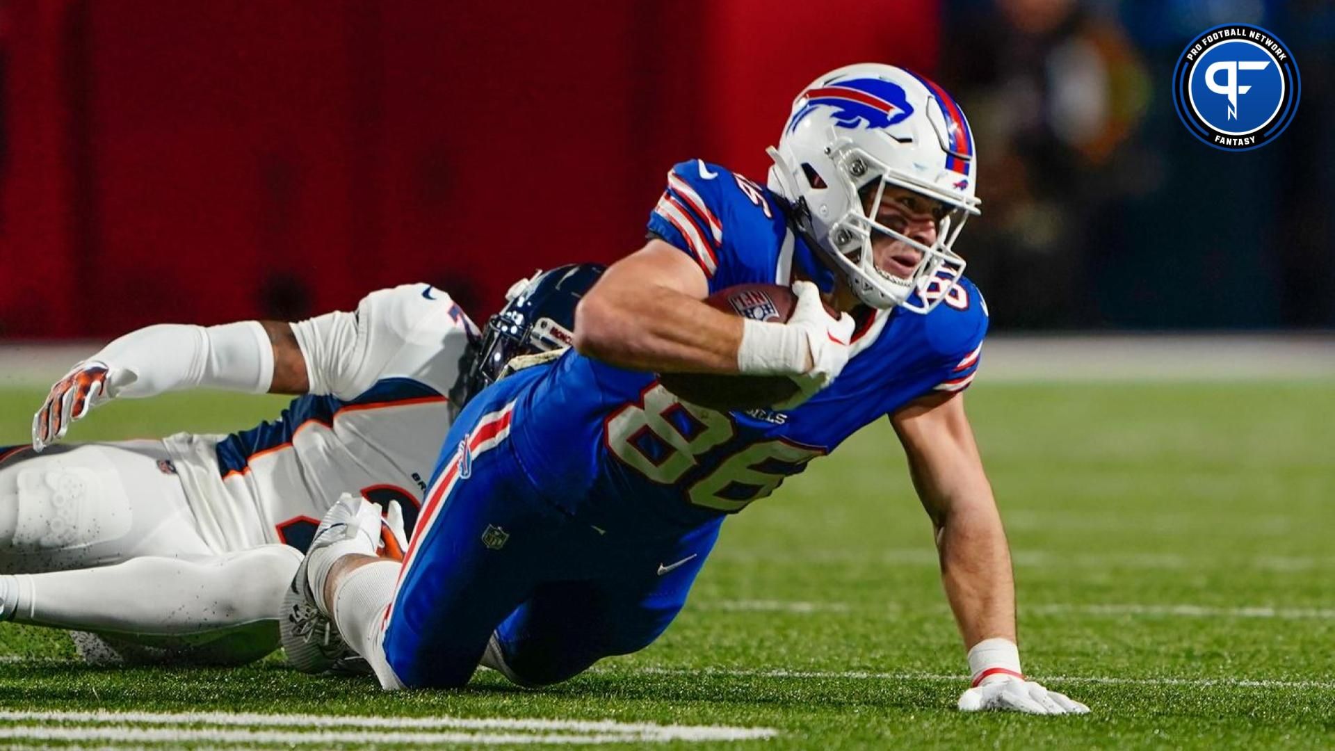 Buffalo Bills TE Dalton Kincaid (86) is tackled against the Denver Broncos.