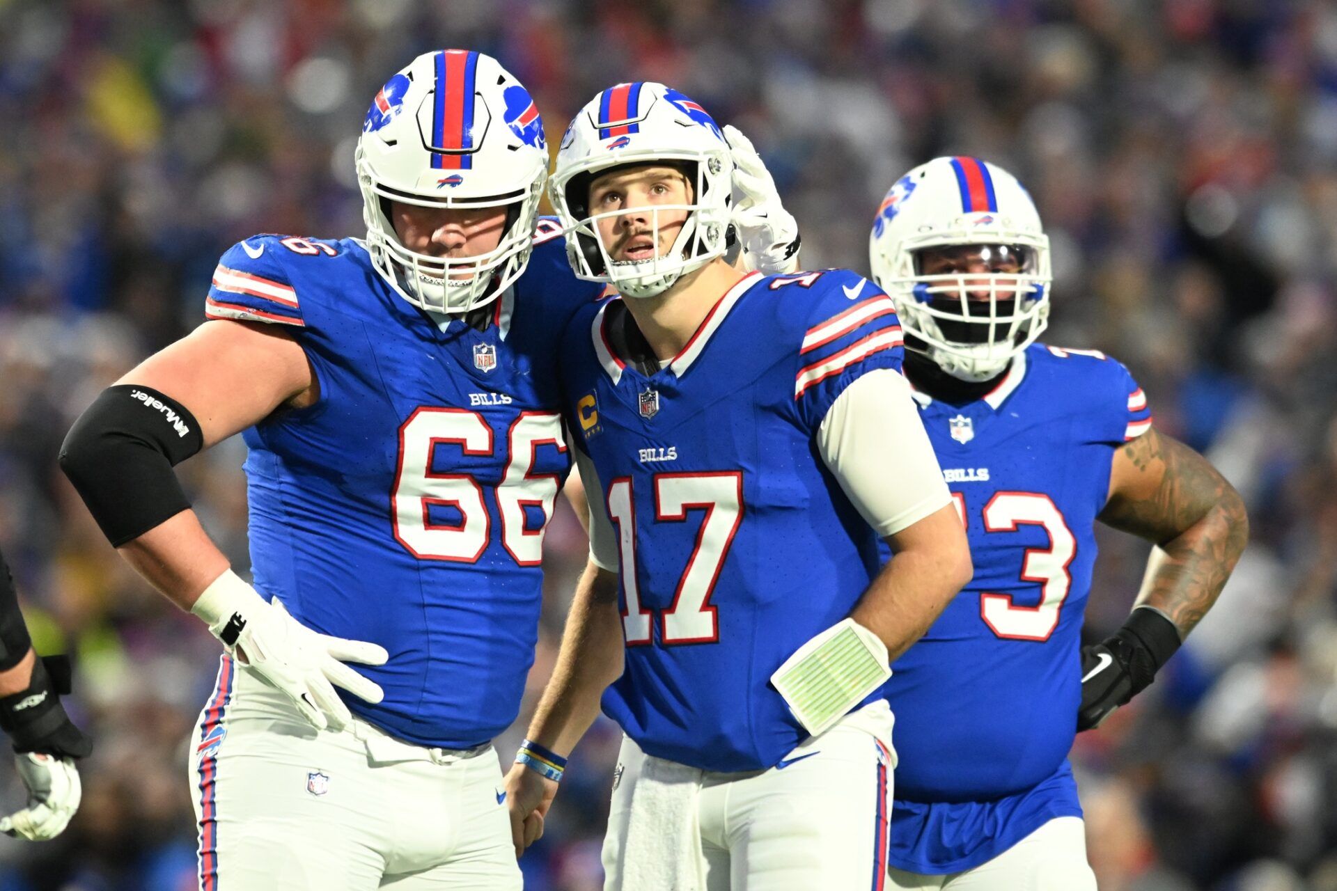 Buffalo Bills guard Connor McGovern (66) talks with quarterback Josh Allen (17) in the first half against the Dallas Cowboys at Highmark Stadium.