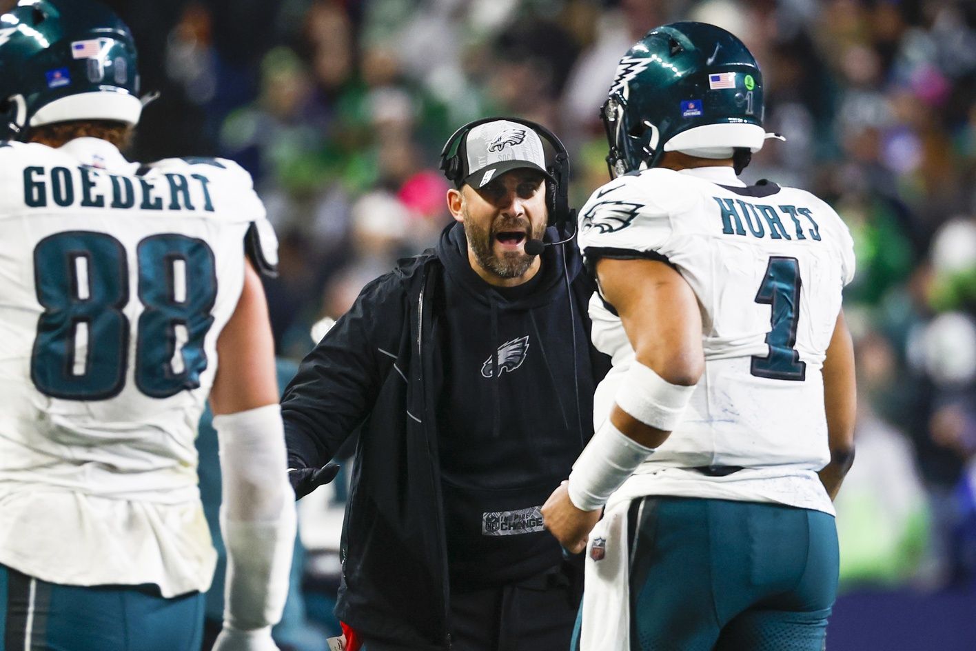 Philadelphia Eagles head coach Nick Sirianni greets quarterback Jalen Hurts (1) following a touchdown against the Seattle Seahawks during the third quarter at Lumen Field.