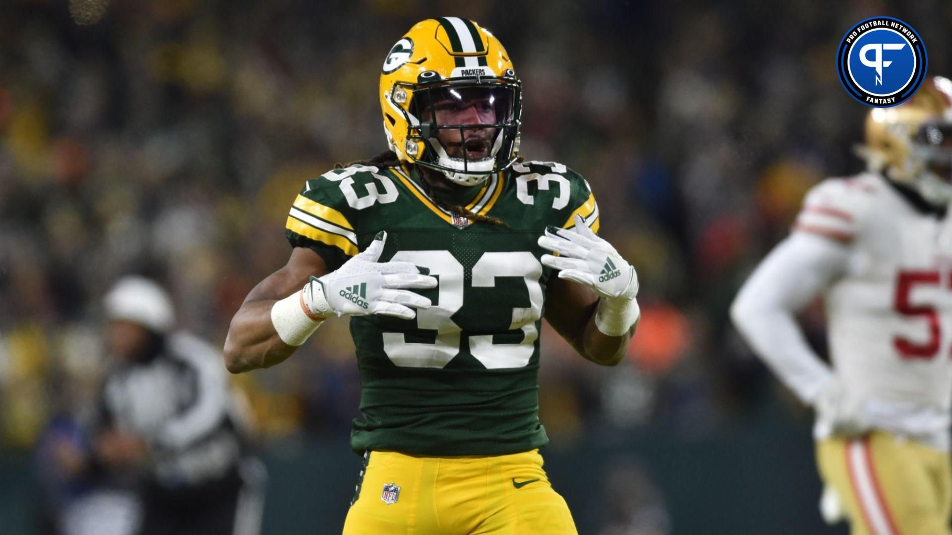 Green Bay Packers running back Aaron Jones (33) reacts after a play during the first quarter during a NFC Divisional playoff football game against the San Francisco 49ers at Lambeau Field.