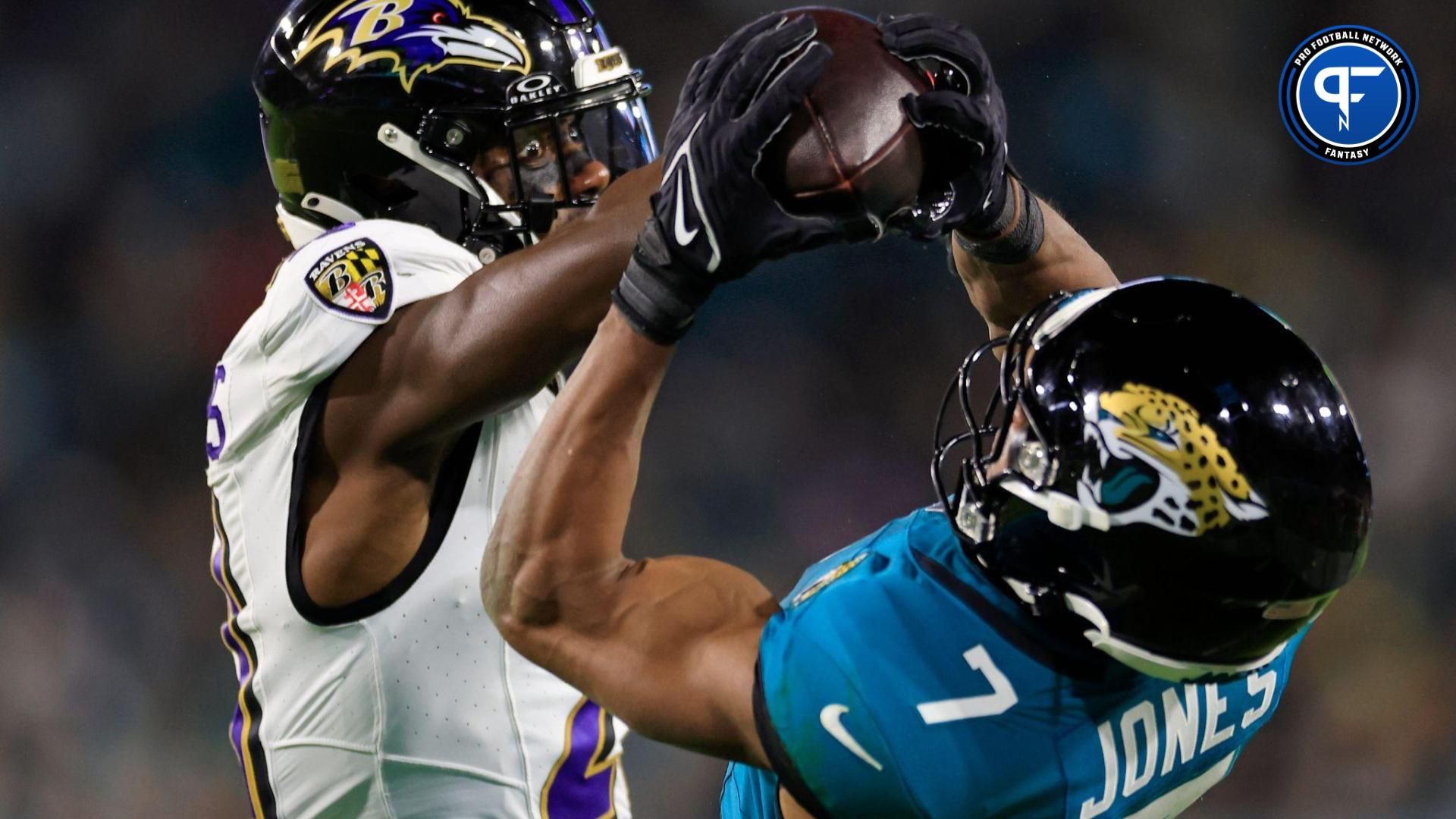 Jacksonville Jaguars wide receiver Zay Jones (7) catches a pass as Baltimore Ravens cornerback Brandon Stephens (21) defends during the second quarter of a regular season NFL football matchup Sunday, Dec. 17, 2023 at EverBank Stadium in Jacksonville, Fla. The Baltimore Ravens defeated the Jacksonville Jaguars 23-7.