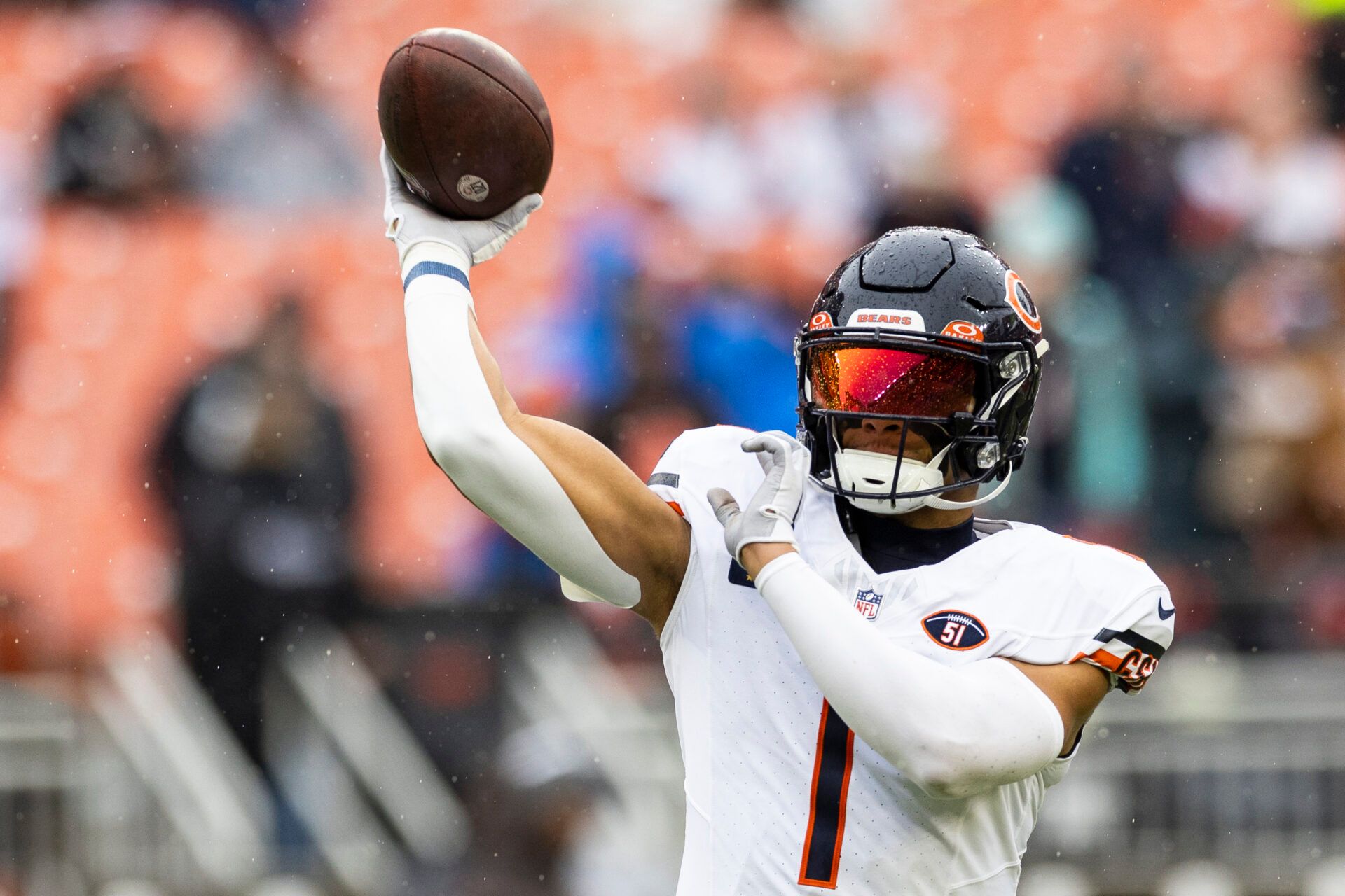 Chicago Bears quarterback Justin Fields (1) throws the ball during warm ups before the game against the Cleveland Browns at Cleveland Browns Stadium.