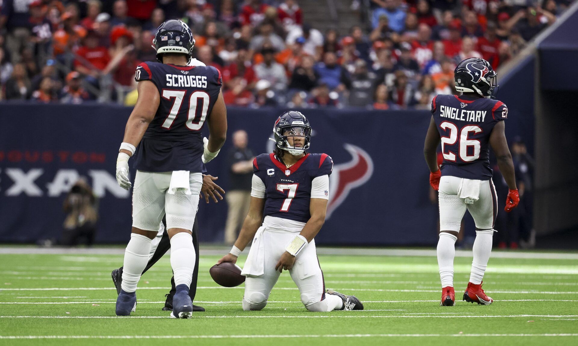 Houston Texans quarterback C.J. Stroud (7) reacts after being sacked during the fourth quarter against the Denver Broncos at NRG Stadium.