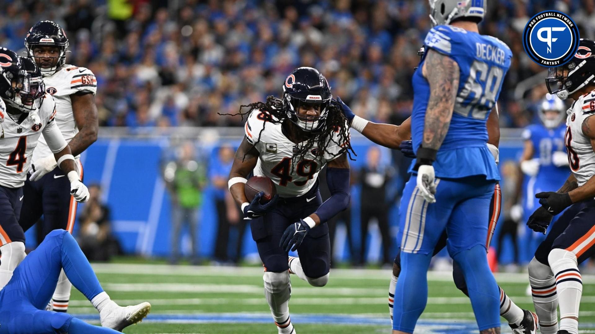 Chicago Bears linebacker Tremaine Edmunds (49) celebrates with teammates after intercepting a pass against the Detroit Lions in the third quarter at Ford Field.