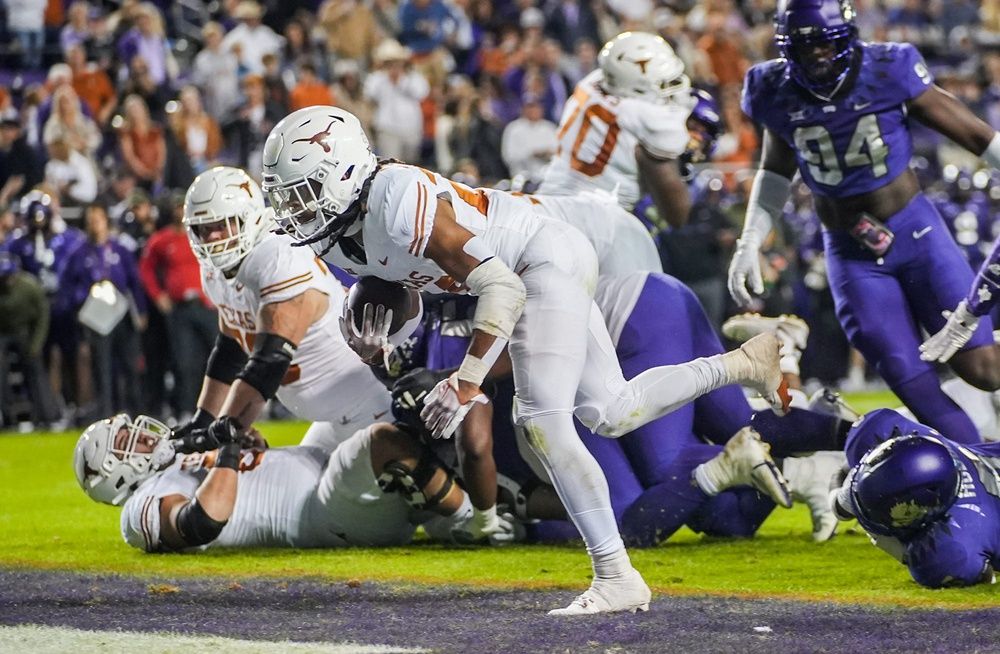 Texas Longhorns running back Jonathon Brooks (24) runs into the end zone for a touchdown against TCU.