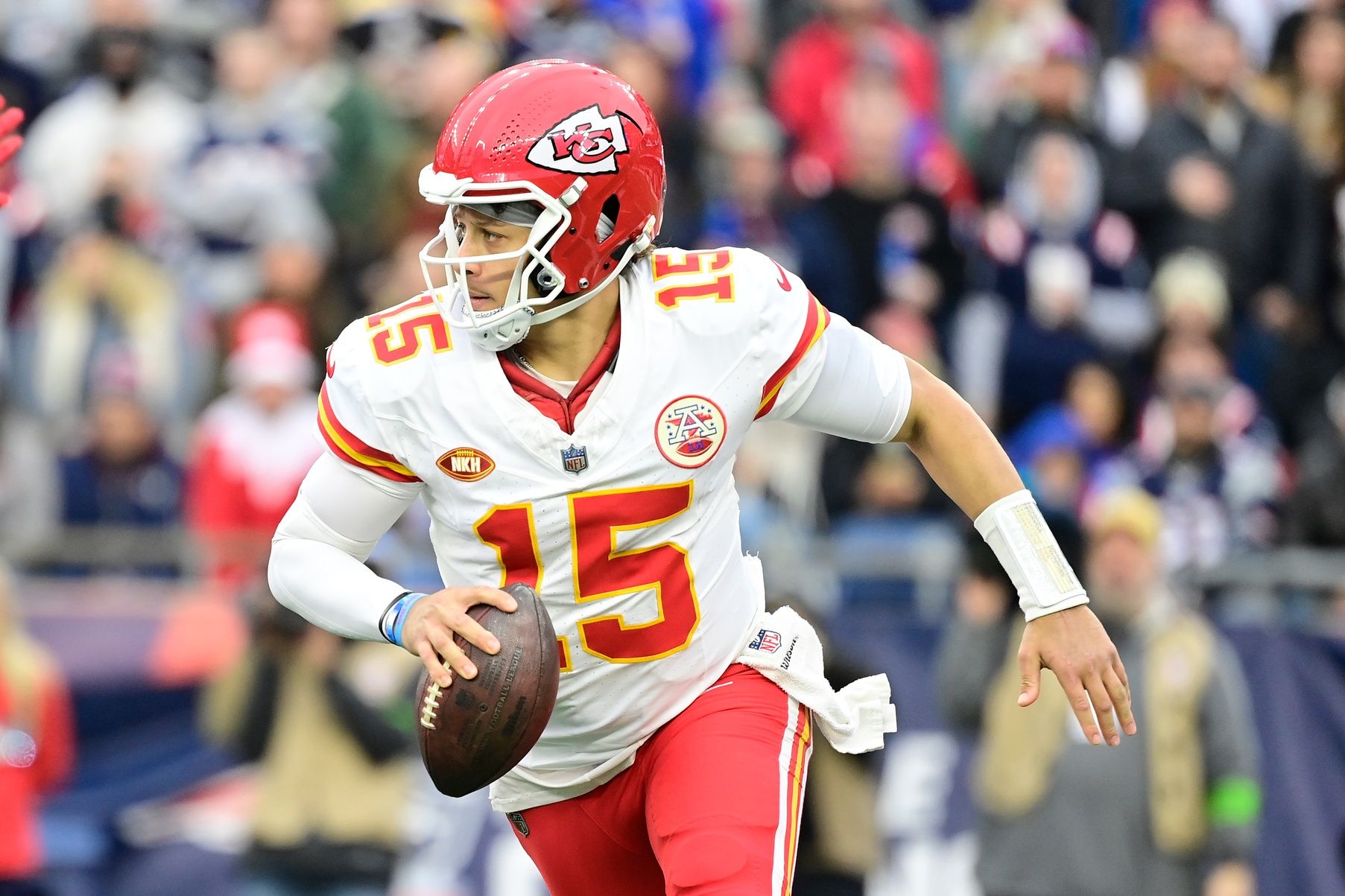 Kansas City Chiefs quarterback Patrick Mahomes (15) looks to pass the ball during the second half against the New England Patriots at Gillette Stadium.