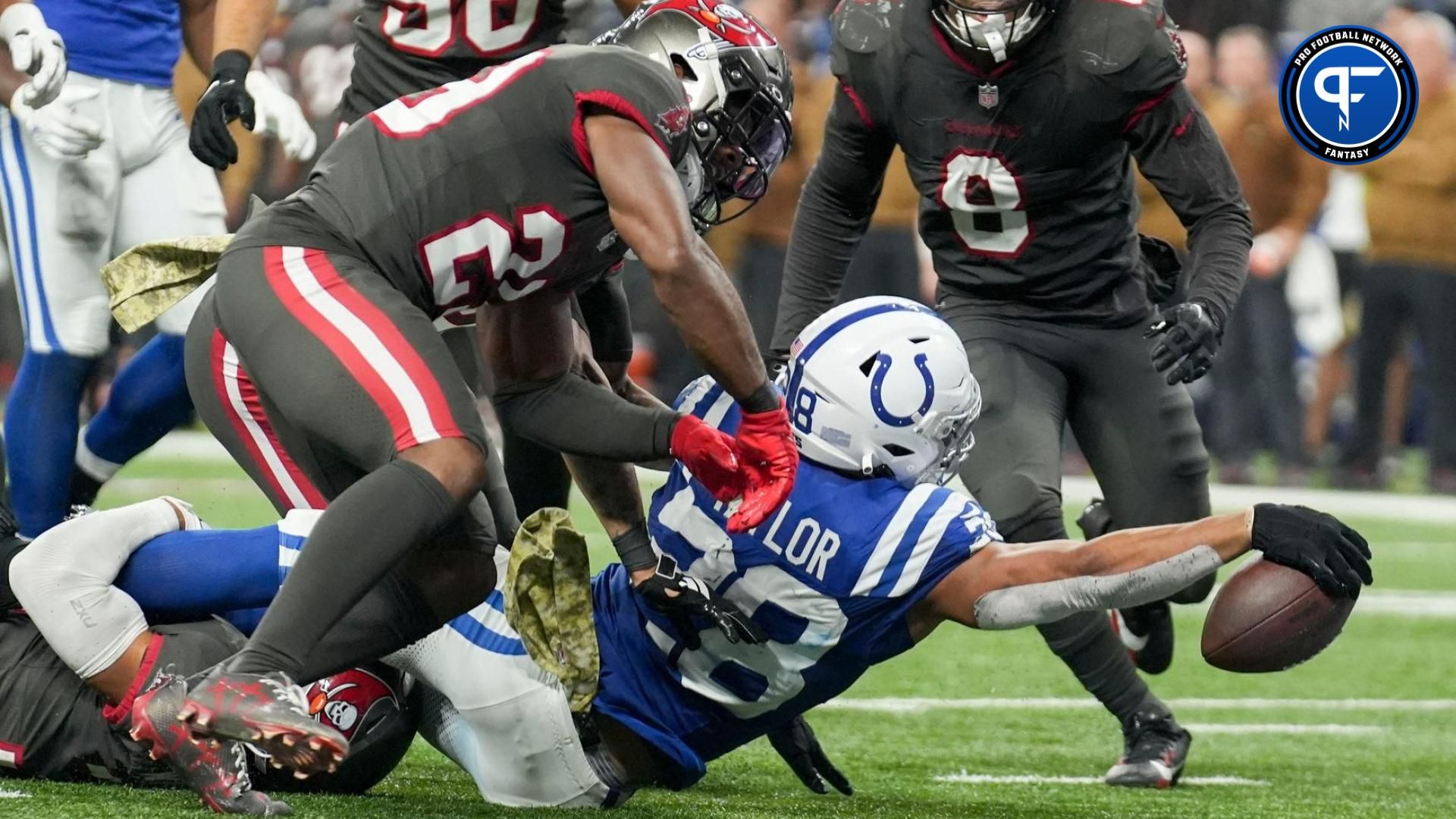 Indianapolis Colts RB Jonathan Taylor (28) reaches for the end zone against the Tampa Bay Buccaneers.