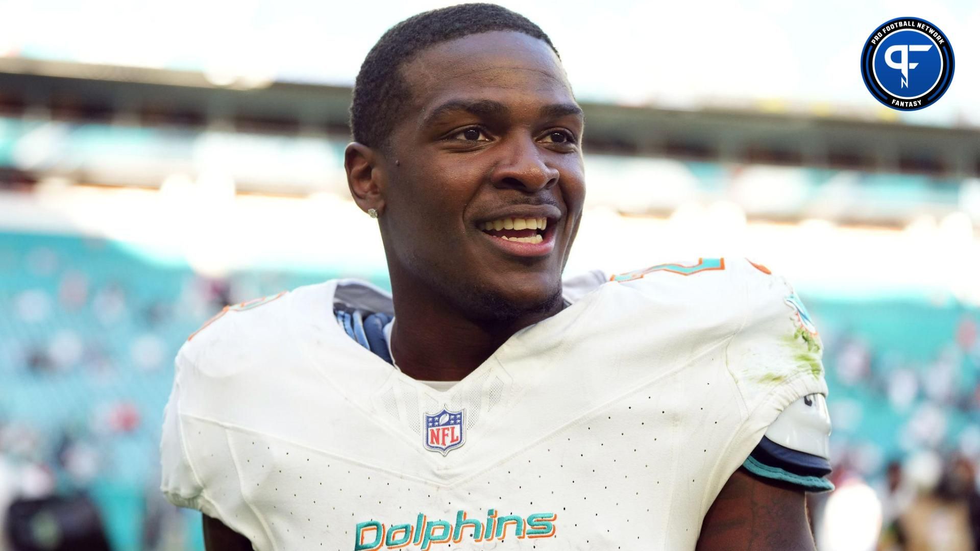 Miami Dolphins running back De'Von Achane (28) walks off the field after defeating the New York Jets at Hard Rock Stadium.