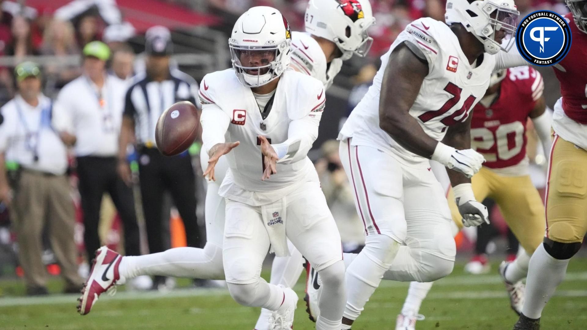 Arizona Cardinals quarterback Kyler Murray (1) pitches the ball against the San Francisco 49ers during the first quarter at State Farm Stadium in Glendale on Dec. 17, 2023.