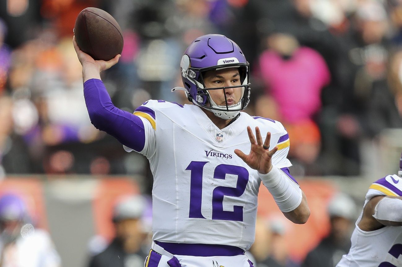 Minnesota Vikings quarterback Nick Mullens (12) throws a pass against the Cincinnati Bengals in the first half at Paycor Stadium.