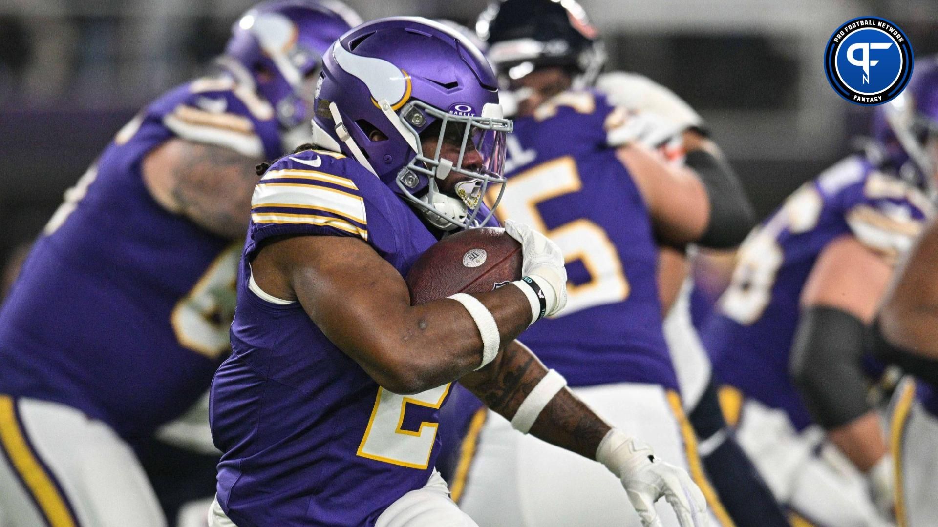 Minnesota Vikings running back Alexander Mattison (2) runs the ball against the Chicago Bears at U.S. Bank Stadium.