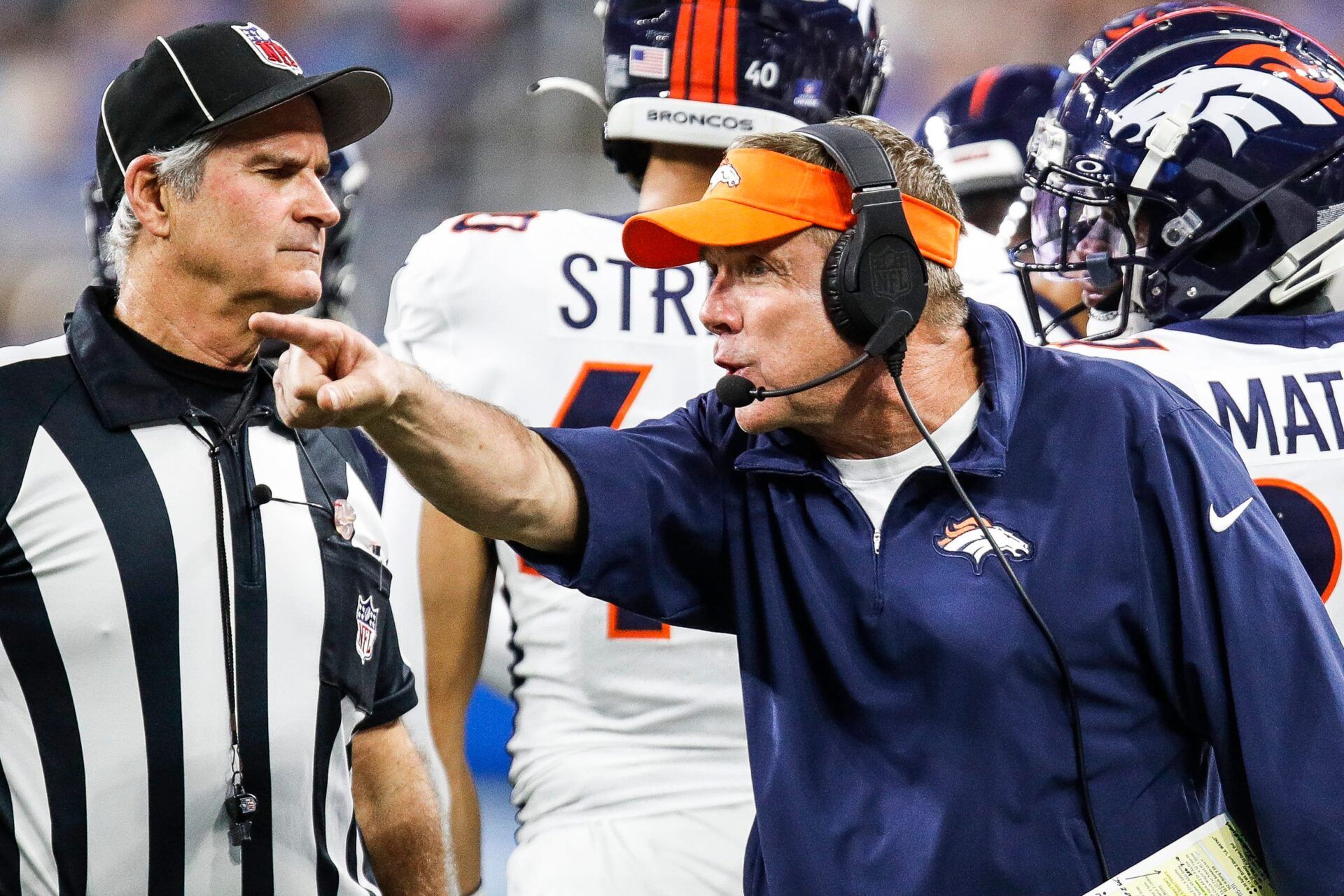 Denver Broncos head coach Sean Payton talks to a referee during the second half against the Detroit Lions at Ford Field