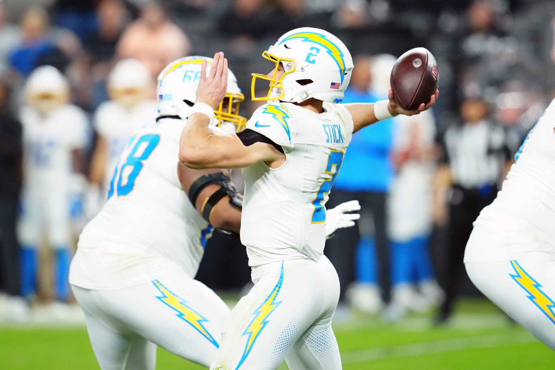 Los Angeles Chargers quarterback Easton Stick (2) throws a pass to wide receiver Joshua Palmer (not pictured) for a touchdown against the Las Vegas Raiders in the third quarter at Allegiant Stadium.