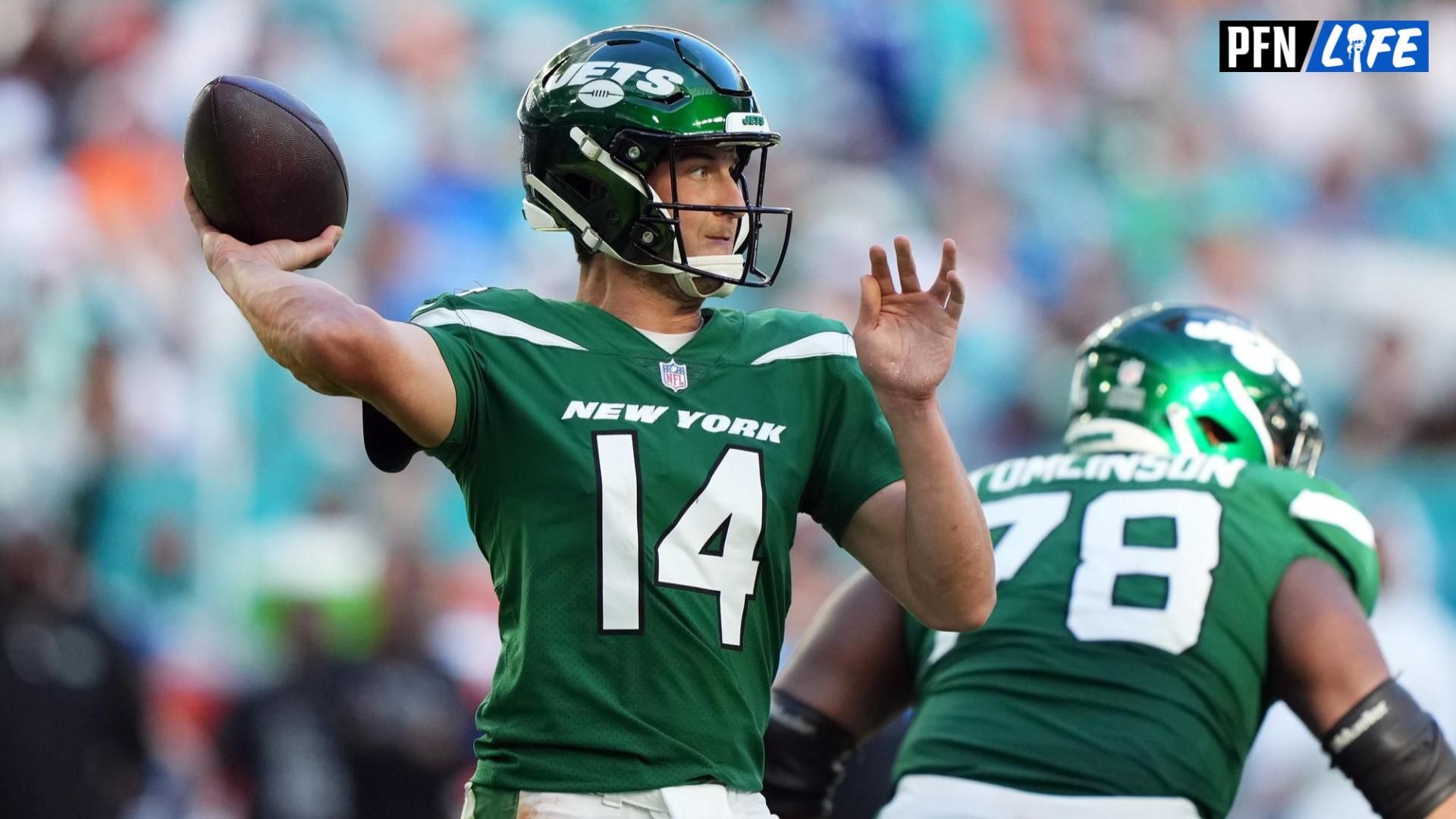 New York Jets quarterback Trevor Siemian (14) attempts a pass against the Miami Dolphins during the second half at Hard Rock Stadium.