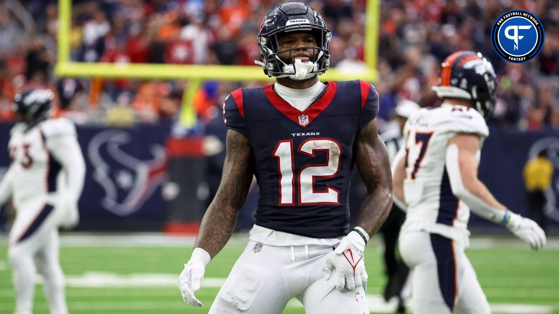 Houston Texans wide receiver Nico Collins (12) reacts after making a reception during the fourth quarter against the Denver Broncos at NRG Stadium.