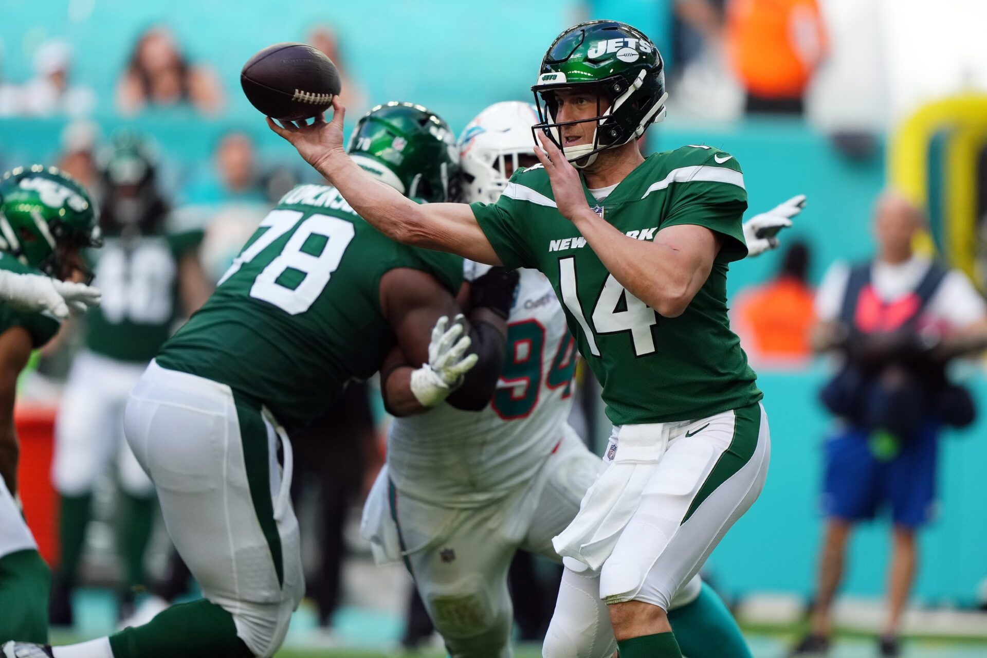 New York Jets quarterback Trevor Siemian (14) attempts a pass against the Miami Dolphins during the second half at Hard Rock Stadium.