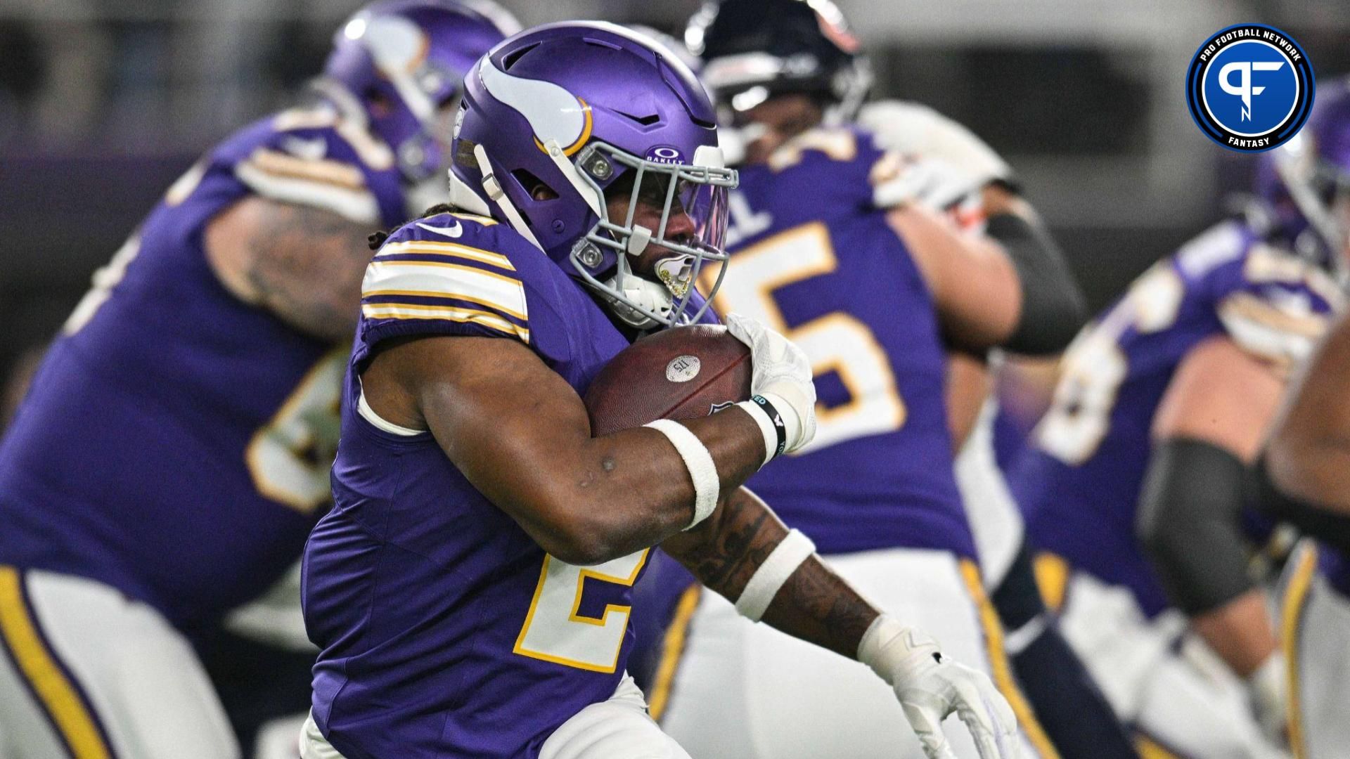 Minnesota Vikings running back Alexander Mattison (2) runs the ball against the Chicago Bears at U.S. Bank Stadium.