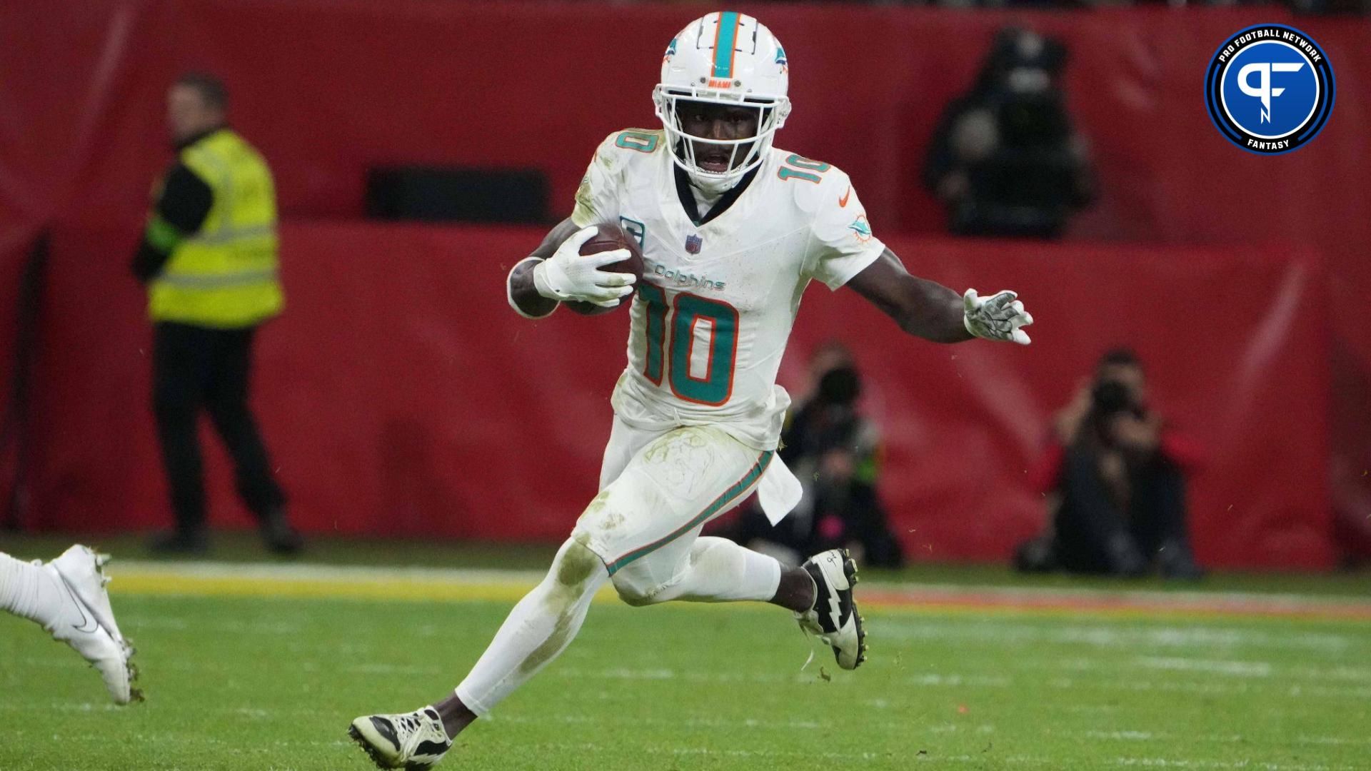 Miami Dolphins wide receiver Tyreek Hill (10) carries the ball against the Kansas City Chiefs in the second half during an NFL International Series game at Deutsche Bank Park.