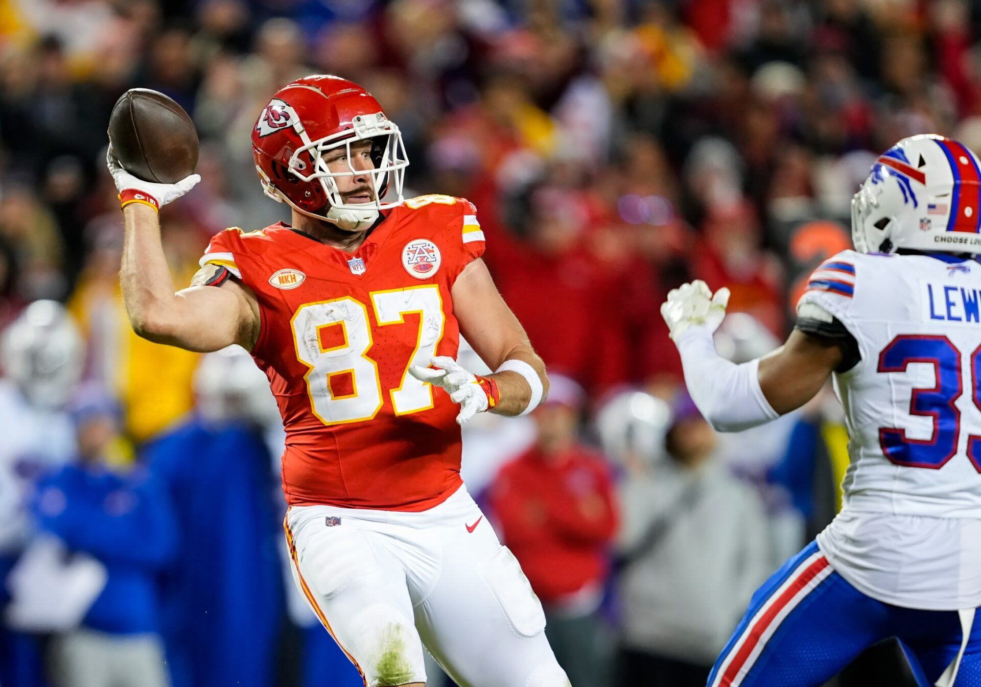 Kansas City Chiefs TE Travis Kelce (87) looks to toss the ball against the Buffalo Bills.