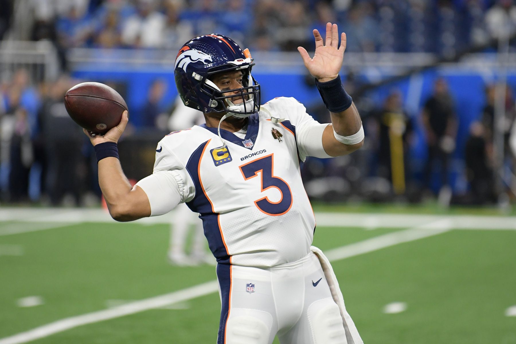 Denver Broncos QB Russell Wilson (3) warms up before a game.