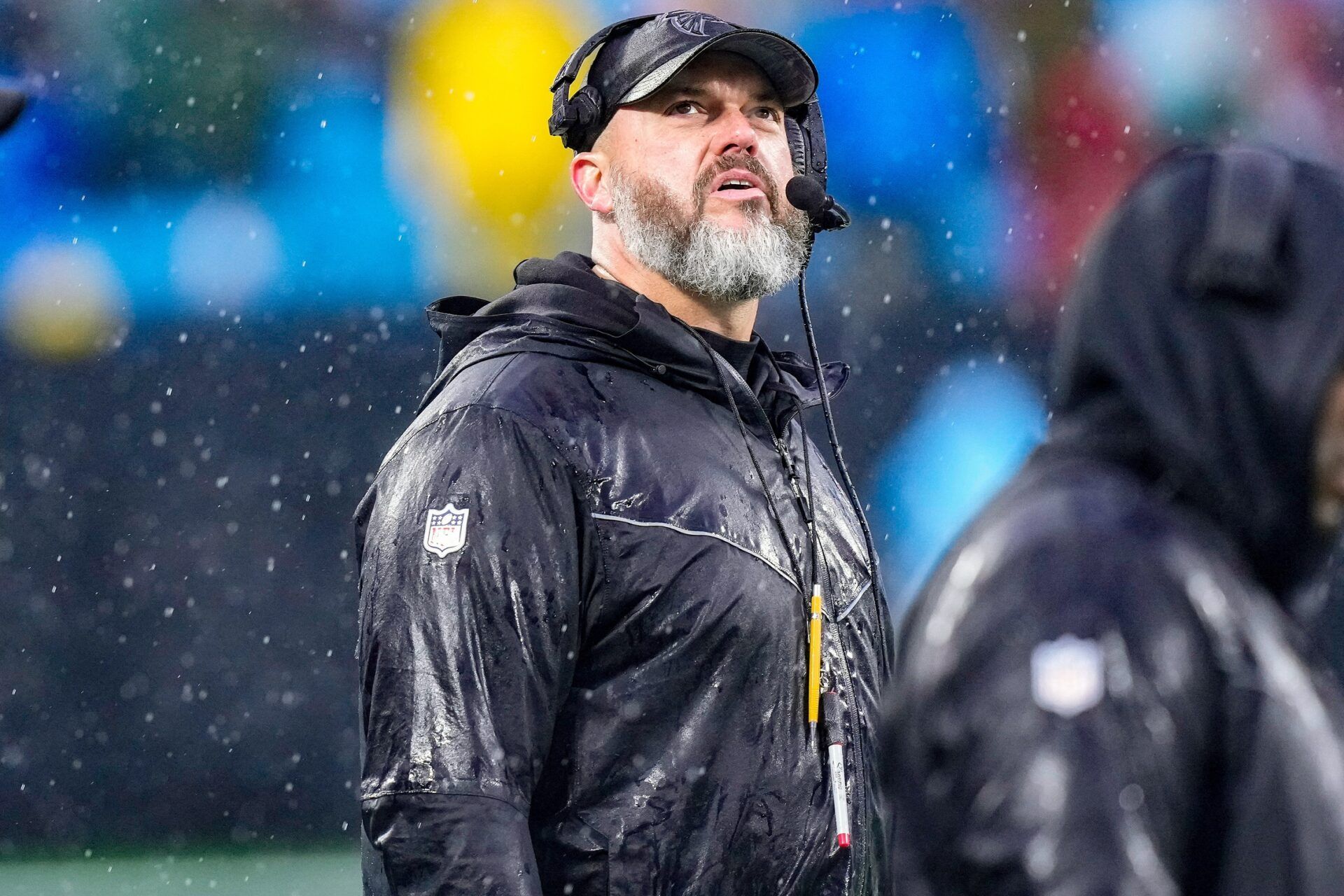 Atlanta Falcons head coach Arthur Smith looks on in the rain during the game against the Carolina Panthers.