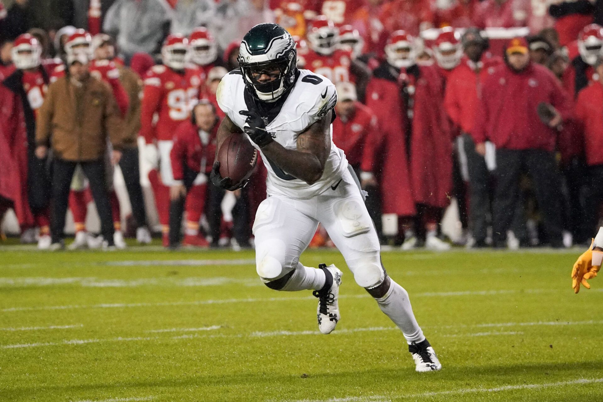 Philadelphia Eagles running back D'Andre Swift (0) runs the ball against the Kansas City Chiefs during the game at GEHA Field at Arrowhead Stadium.