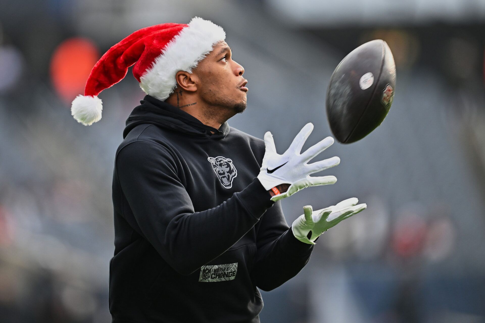 Chicago Bears wide receiver DJ Moore (2) warms up before a game against the Arizona Cardinals at Soldier Field.