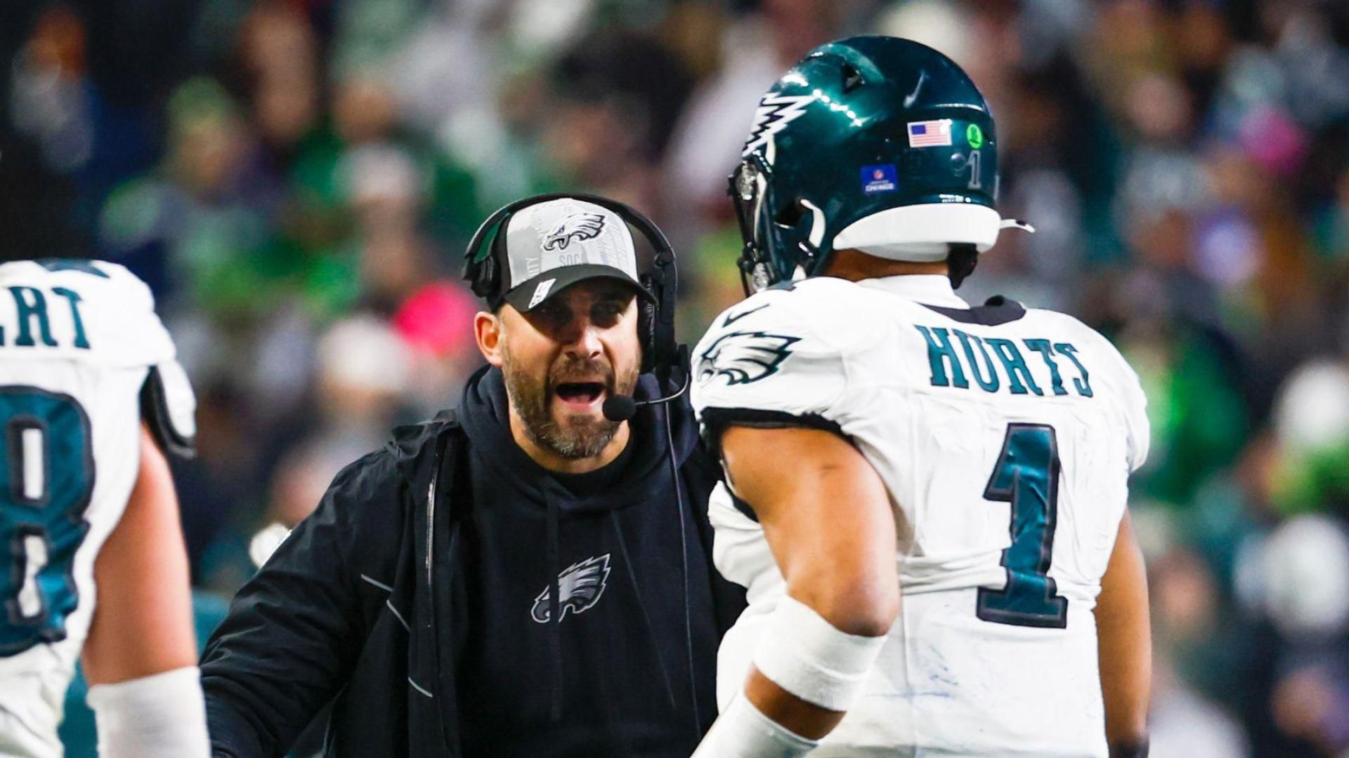 Philadelphia Eagles head coach Nick Sirianni greets quarterback Jalen Hurts (1) following a touchdown against the Seattle Seahawks during the third quarter at Lumen Field.