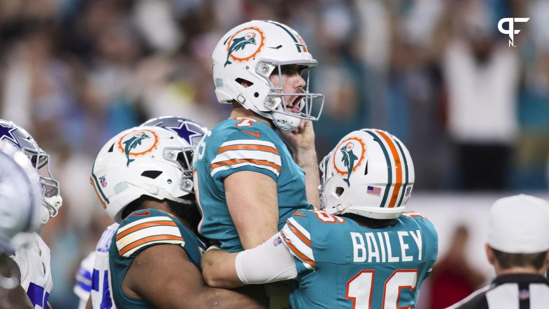 Miami Dolphins place kicker Jason Sanders (7) celebrates with punter Jake Bailey (16) after scoring the game-winning field goal against the Dallas Cowboys during the fourth quarter at Hard Rock Stadium.