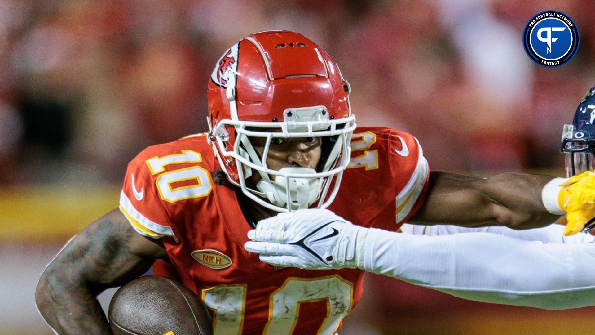 Kansas City Chiefs running back Isiah Pacheco (10) runs the ball during the second quarter against the Denver Broncos at GEHA Field at Arrowhead Stadium.