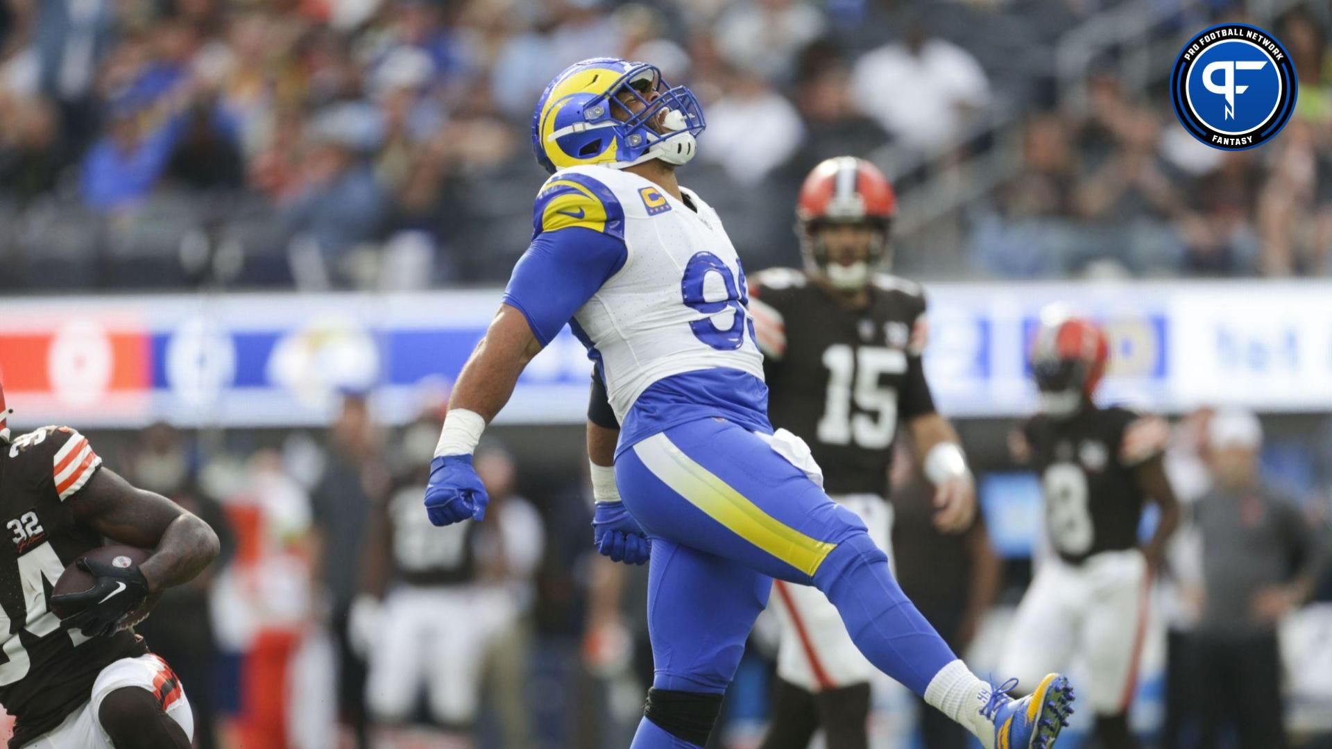 Los Angeles Rams defesnive tackle Aaron Donald (99) celebrates in the first half in a game against the Cleveland Browns at SoFi Stadium.