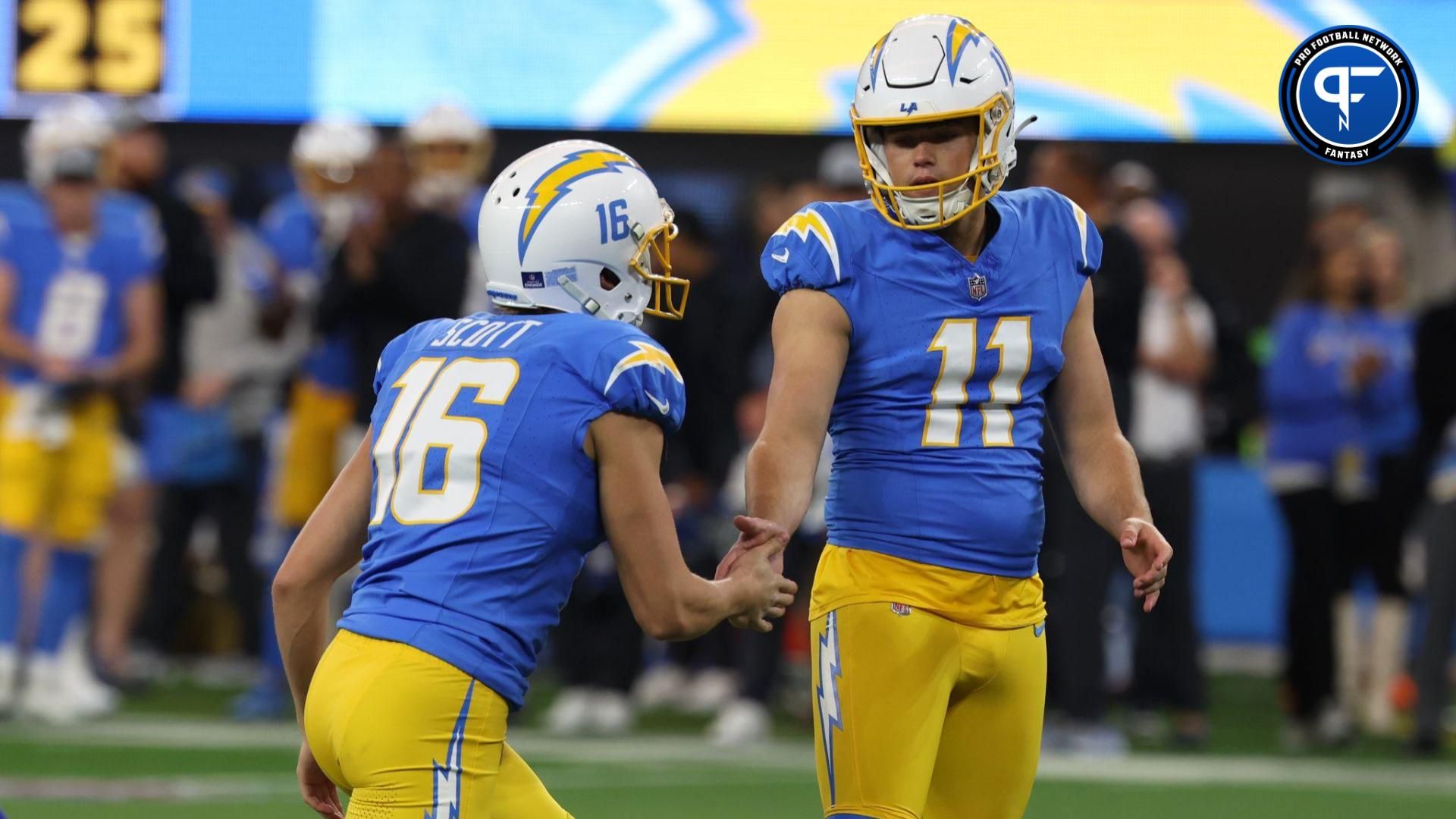 Los Angeles Chargers place kicker Cameron Dicker (11) celebrates with punter JK Scott (16) after making a field goal during the first quarter against the Buffalo Bills at SoFi Stadium.