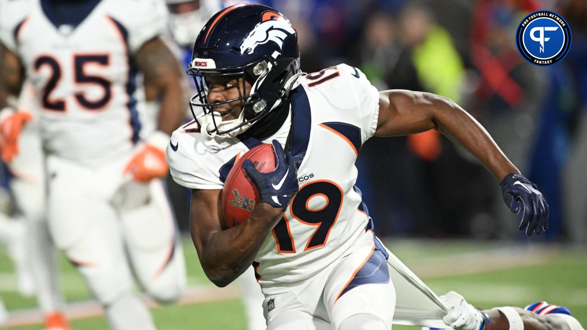 Denver Broncos wide receiver Marvin Mims Jr. (19) returns a kickoff against the Buffalo Bills in the third quarter at Highmark Stadium.