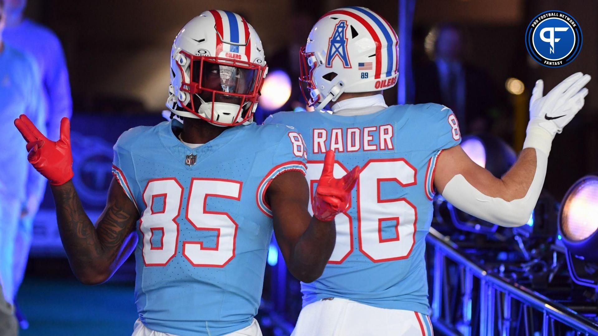 Tennessee Titans tight end Chigoziem Okonkwo (85) and tight end Kevin Rader (86) dance before taking the field before the game against the Houston Texans at Nissan Stadium.