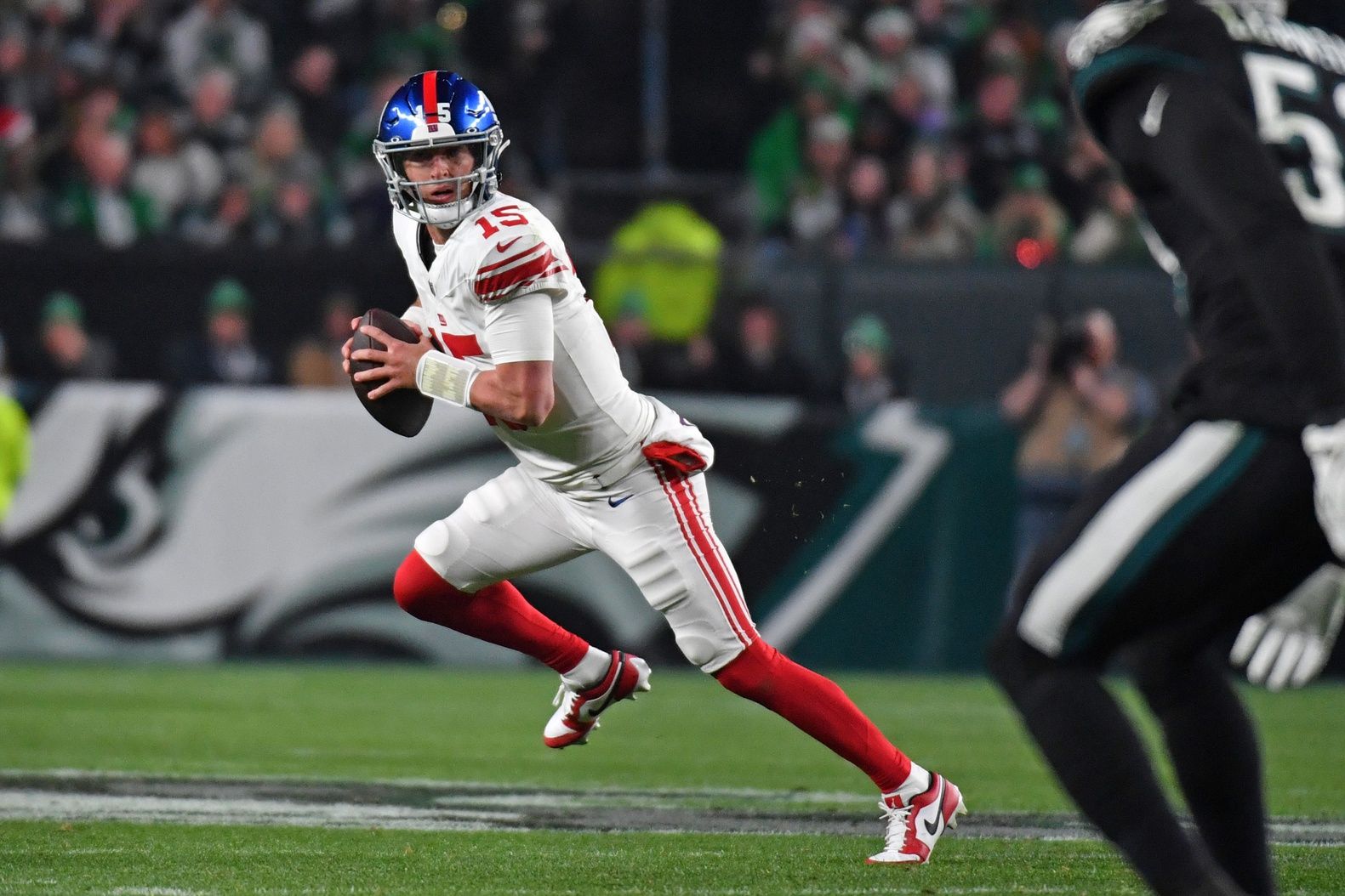 New York Giants quarterback Tommy DeVito (15) looks for a receiver against the Philadelphia Eagles during the second quarter at Lincoln Financial Field.