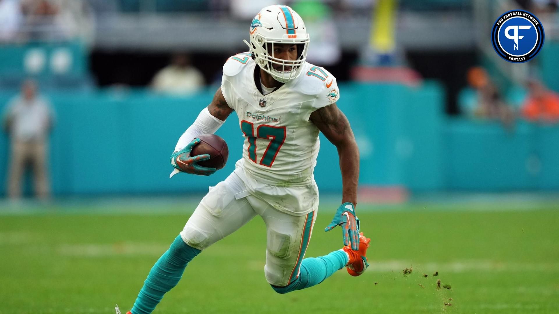 Miami Dolphins wide receiver Jaylen Waddle (17) runs with the ball against the New York Jets during the second half at Hard Rock Stadium.