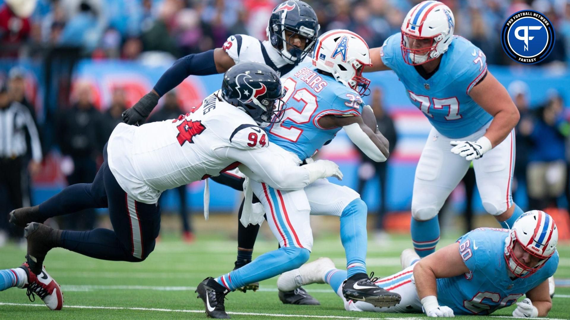 Tennessee Titans running back Tyjae Spears (32) runs against the Houston Texans during their game at Nissan Stadium in Nashville, Tenn., Sunday, Dec. 17, 2023.