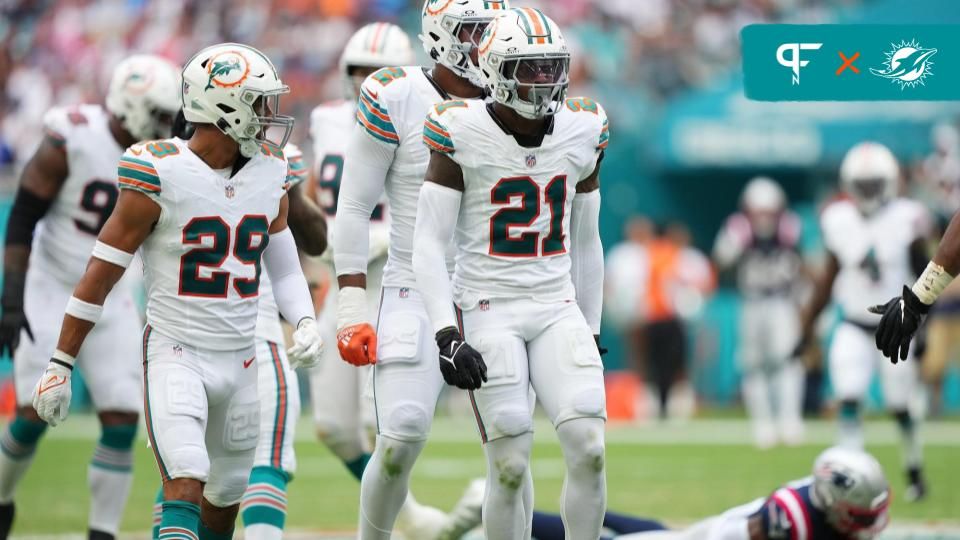 Miami Dolphins safety DeShon Elliott (21) celebrates after making a play against the New England Patriots.