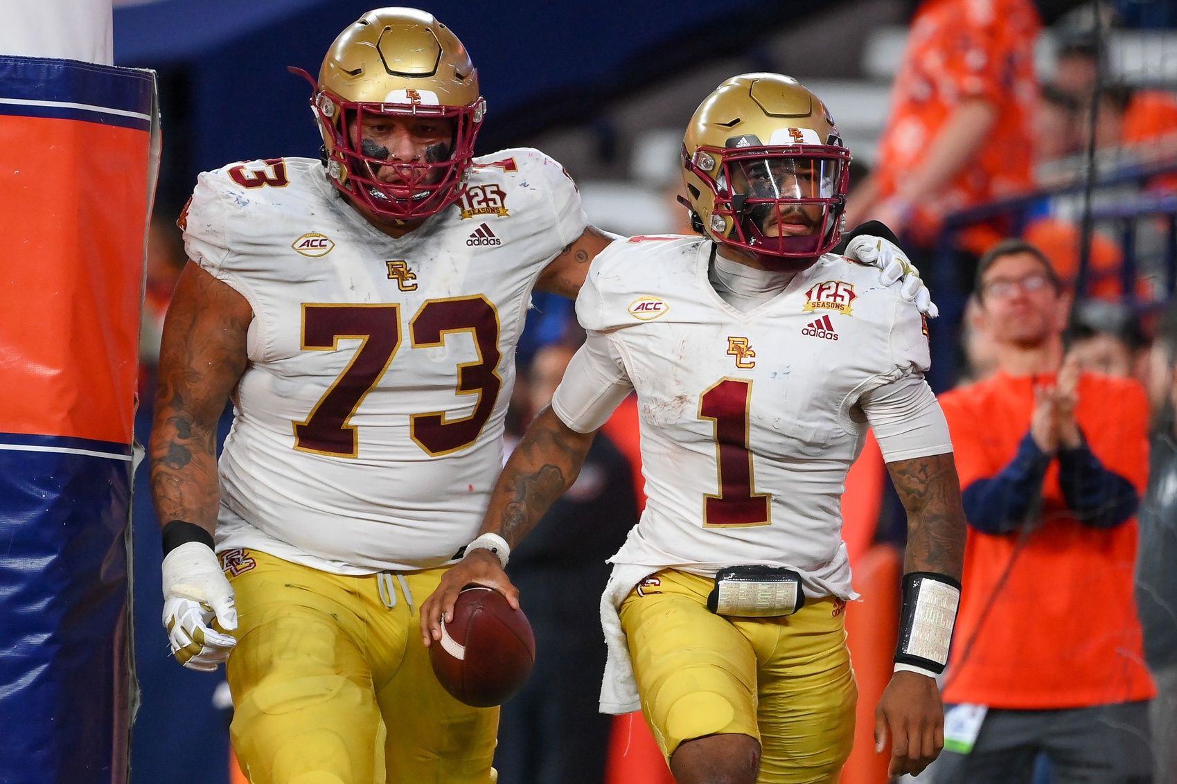 Boston College Eagles quarterback Thomas Castellanos (1) celebrates his touchdown run with teammate offensive lineman Christian Mahogany (73) against the Syracuse Orange during the second half at the JMA Wireless Dome.