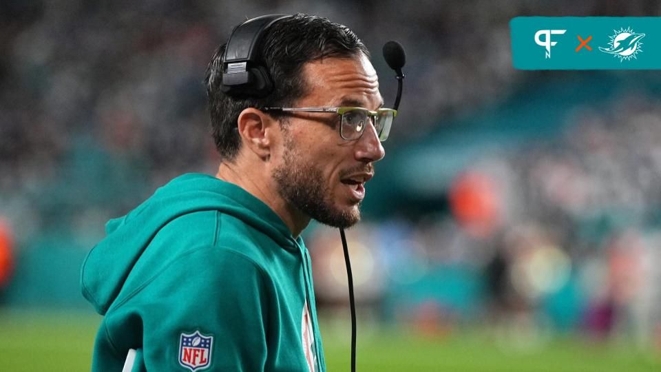 Miami Dolphins head coach Mike McDaniel prepares to call a timeout during the second half against the Dallas Cowboys at Hard Rock Stadium.