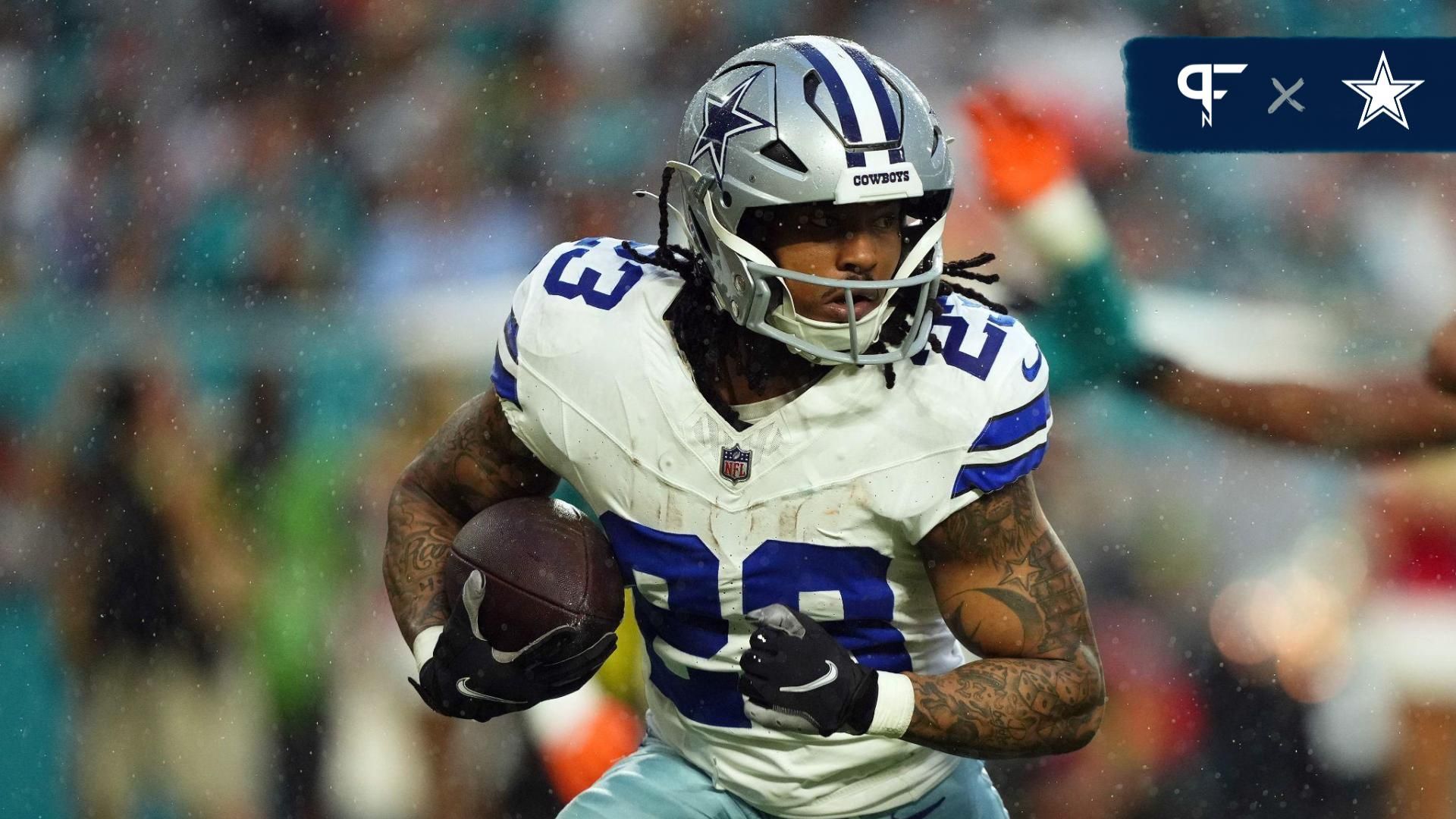 Dallas Cowboys running back Rico Dowdle (23) rushes with the ball during the first half against the Miami Dolphins at Hard Rock Stadium.