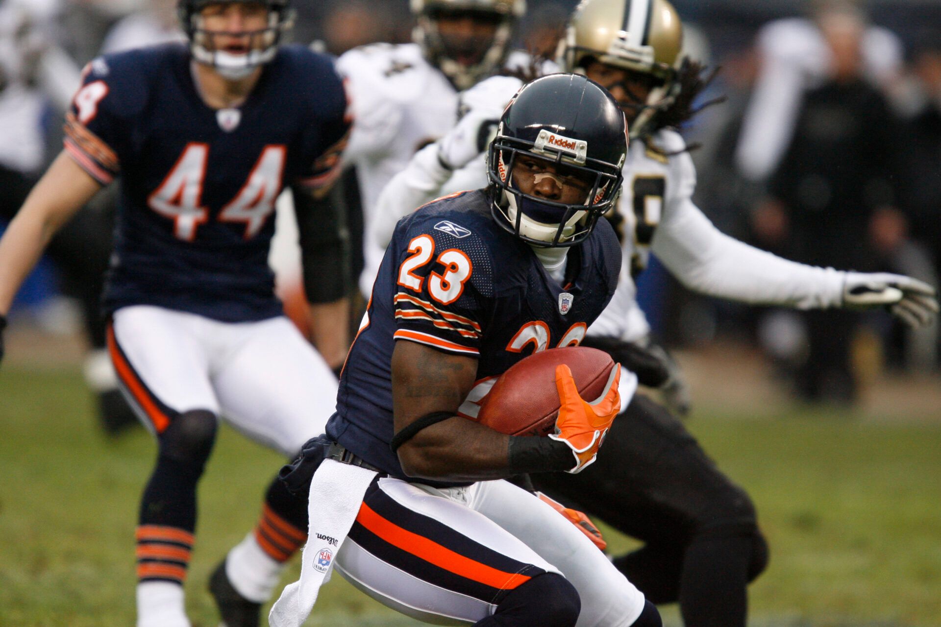 Chicago Bears punt returner Devin Hester (23) returns a punt against the New Orleans Saints in the first half of the NFC Championship game at Soldier Field in Chicago, IL