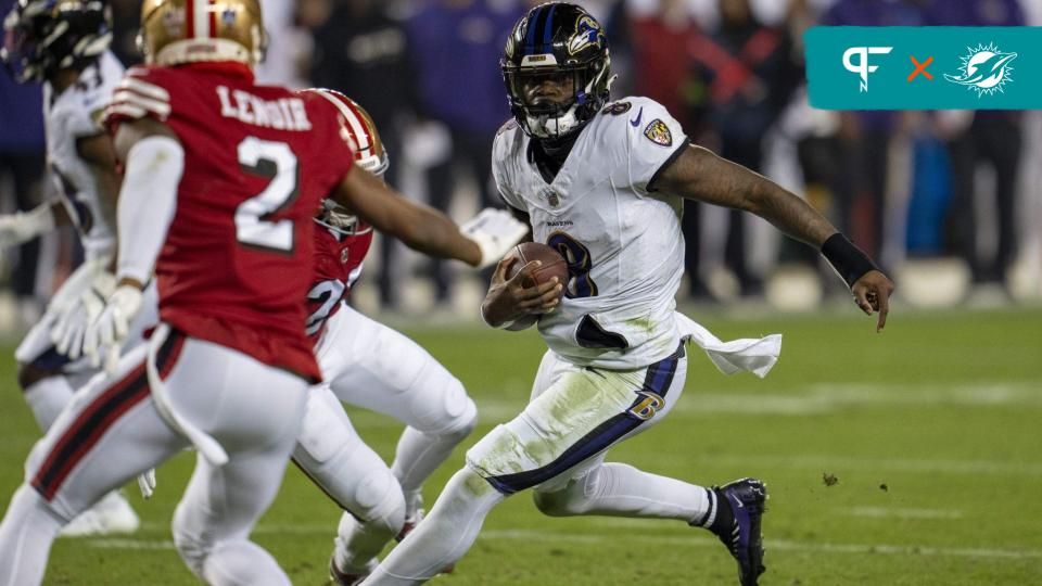 Baltimore Ravens QB Lamar Jackson (8) runs with the ball against the San Francisco 49ers.